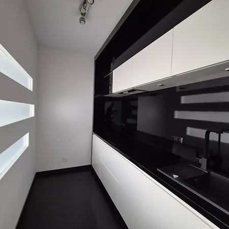 Апартаменты Krawiecka Trzy Zero Dwa *